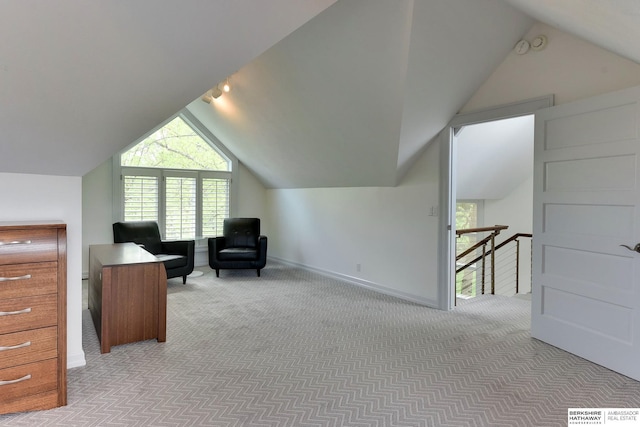 14341 Hamilton St, Omaha, NE 68154 - sitting room with carpet flooring, vaulted ceiling, and an upstairs landing