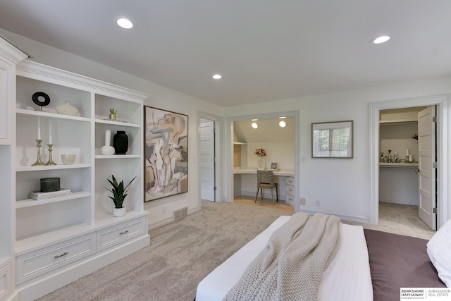 14341 Hamilton St, Omaha, NE 68154 - bedroom with dark carpet, recessed lighting, a spacious closet, and ensuite bath