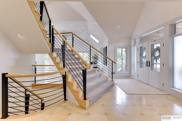 14341 Hamilton St, Omaha, NE 68154 - foyer entrance featuring a high ceiling, recessed lighting, stairs, and tile patterned flooring