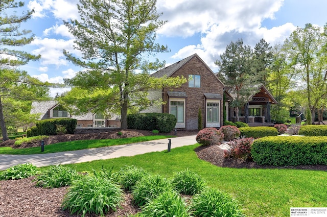 14341 Hamilton St, Omaha, NE 68154 - view of front of property with brick siding and a front yard
