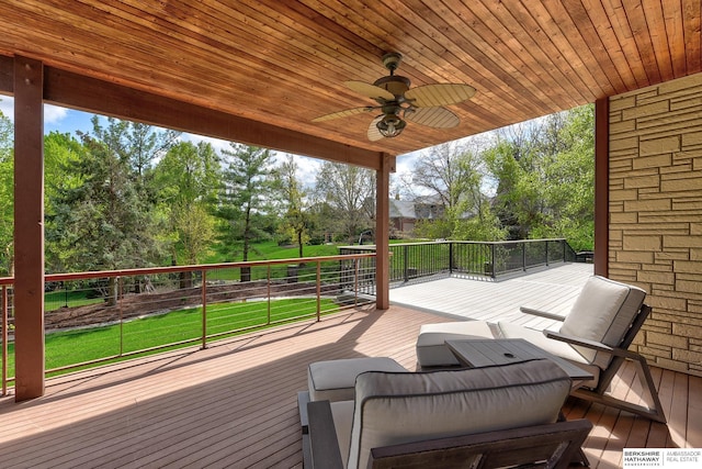 14341 Hamilton St, Omaha, NE 68154 - wooden terrace featuring a ceiling fan and view of scattered trees