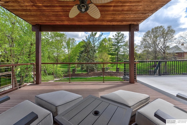 14341 Hamilton St, Omaha, NE 68154 - deck with ceiling fan and view of wooded area