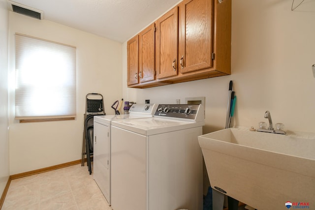 3646 S 77th St, Lincoln, NE 68506 - laundry area with cabinet space and independent washer and dryer