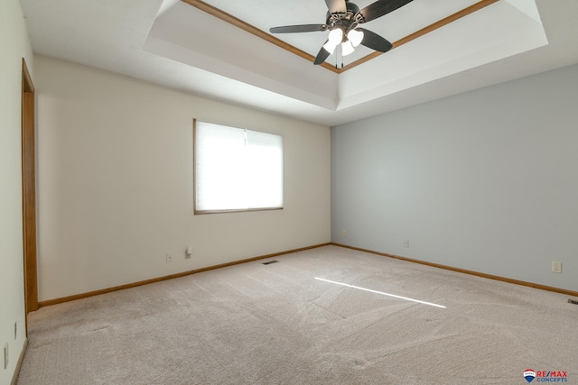 3646 S 77th St, Lincoln, NE 68506 - carpeted empty room with a tray ceiling and ceiling fan