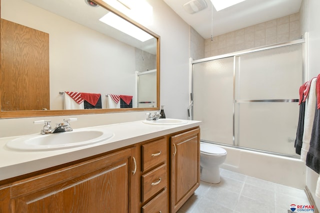 3646 S 77th St, Lincoln, NE 68506 - bathroom with double vanity, bath / shower combo with glass door, and tile patterned flooring