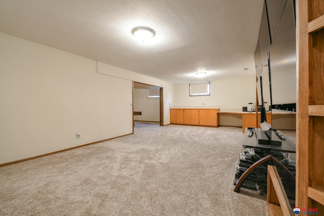 3646 S 77th St, Lincoln, NE 68506 - finished basement featuring light carpet and a textured ceiling
