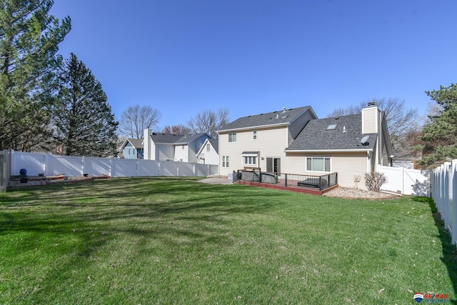 3646 S 77th St, Lincoln, NE 68506 - back of property with a fenced backyard, a chimney, a deck, and a residential view
