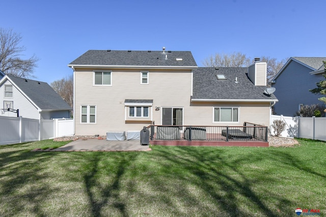 3646 S 77th St, Lincoln, NE 68506 - back of house featuring a patio area, a chimney, a fenced backyard, and a shingled roof