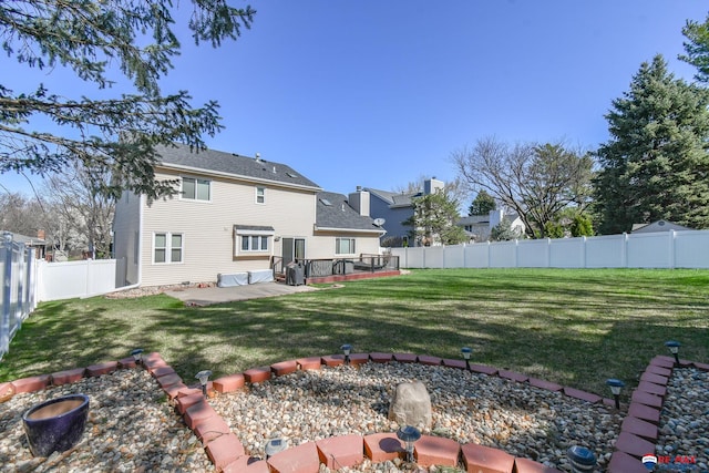 3646 S 77th St, Lincoln, NE 68506 - back of house featuring a deck, a fenced backyard, and a patio area