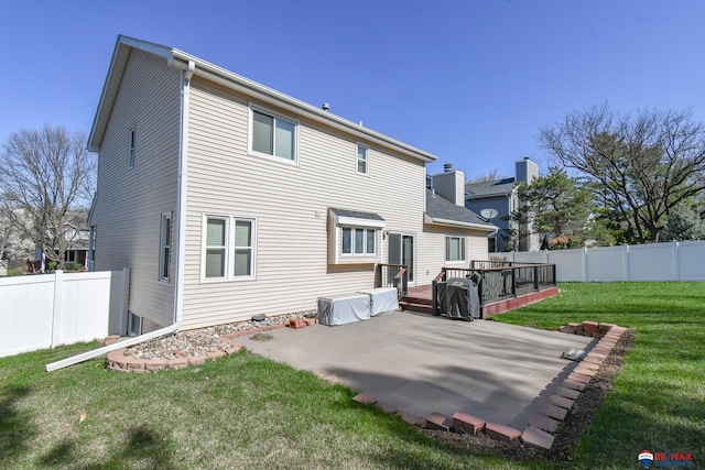 3646 S 77th St, Lincoln, NE 68506 - rear view of house featuring a patio area and a wooden deck