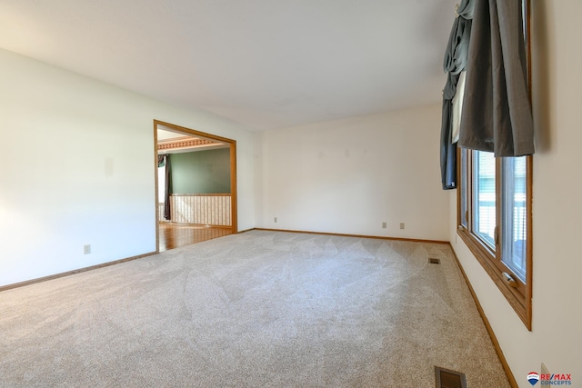 3646 S 77th St, Lincoln, NE 68506 - spare room with light colored carpet and baseboards