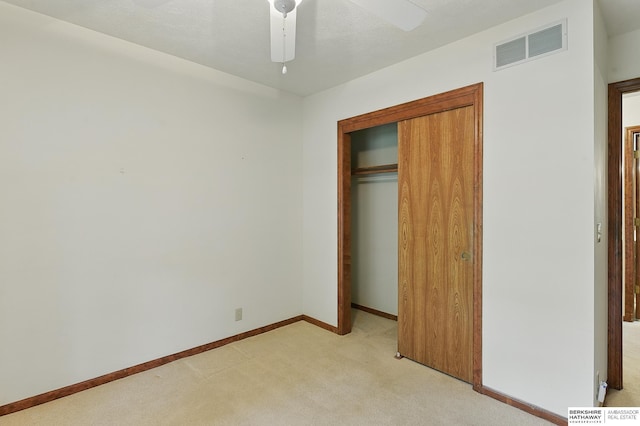 15618 L St, Omaha, NE 68135 - unfurnished bedroom featuring light carpet, a closet, and ceiling fan