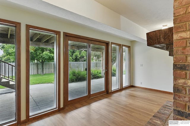 15618 L St, Omaha, NE 68135 - entryway featuring light wood-type flooring and stairway