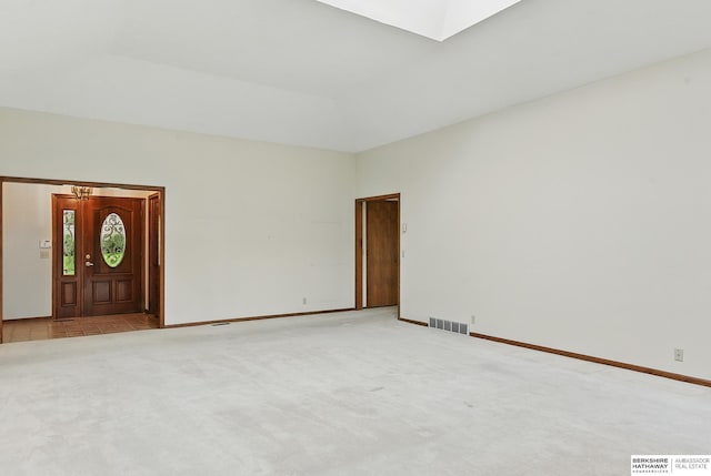 15618 L St, Omaha, NE 68135 - spare room featuring light colored carpet and high vaulted ceiling