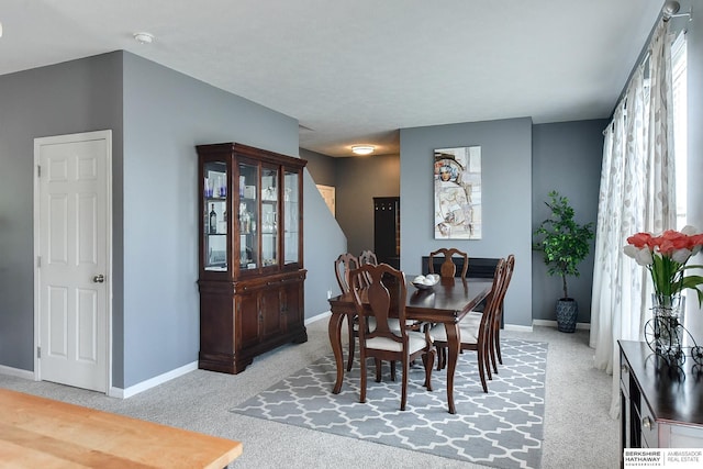 16501 Aurora St, Omaha, NE 68136 - dining area featuring light colored carpet and baseboards