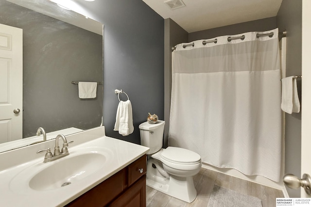 16501 Aurora St, Omaha, NE 68136 - full bath with vanity, wood finished floors, and shower / bath combo