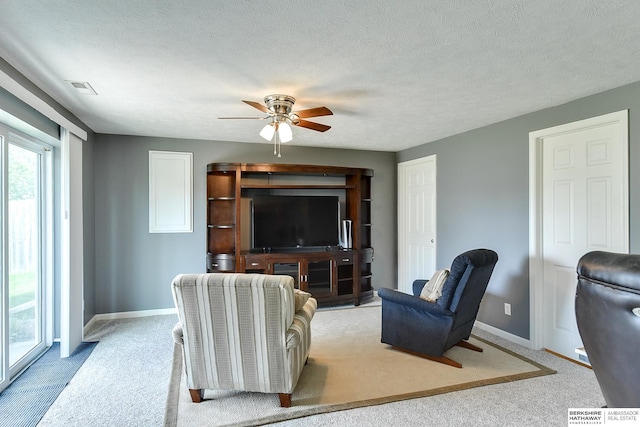 16501 Aurora St, Omaha, NE 68136 - living area with carpet floors and ceiling fan