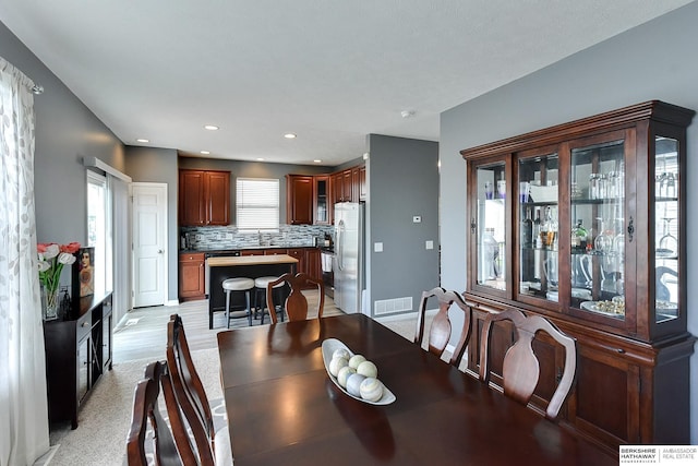 16501 Aurora St, Omaha, NE 68136 - dining room featuring baseboards and recessed lighting