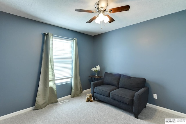 16501 Aurora St, Omaha, NE 68136 - sitting room featuring a ceiling fan and carpet flooring