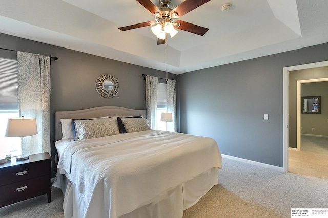 16501 Aurora St, Omaha, NE 68136 - bedroom featuring a raised ceiling, light carpet, and a ceiling fan