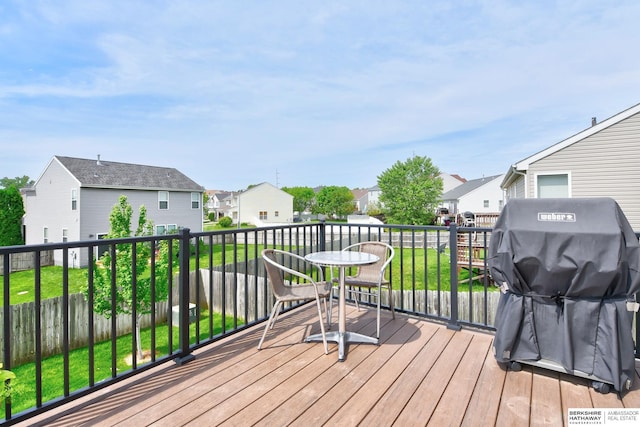 16501 Aurora St, Omaha, NE 68136 - wooden deck with a residential view, area for grilling, and a yard