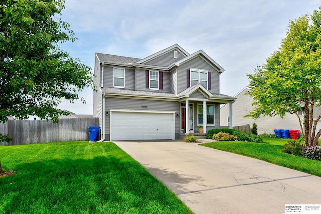 16501 Aurora St, Omaha, NE 68136 - traditional-style house with an attached garage and driveway