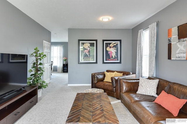 16501 Aurora St, Omaha, NE 68136 - carpeted living area with baseboards