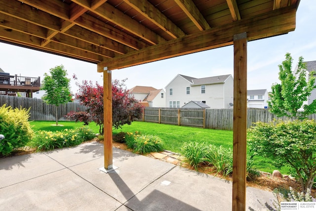 16501 Aurora St, Omaha, NE 68136 - fenced backyard featuring a patio and a residential view