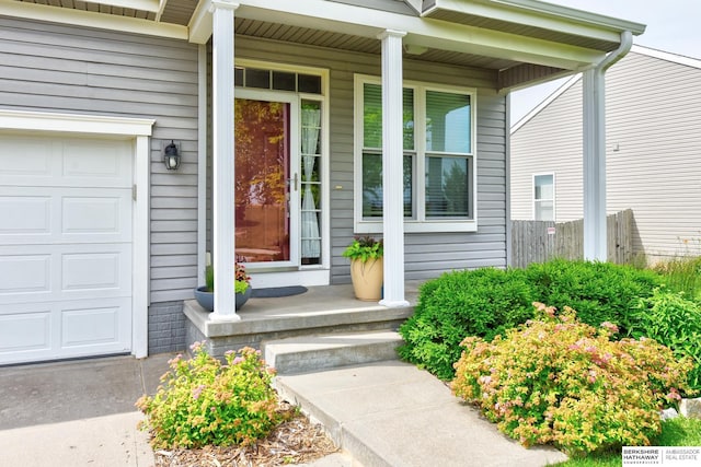 16501 Aurora St, Omaha, NE 68136 - entrance to property with covered porch and a garage