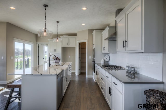 3103 N 184th St, Elkhorn, NE 68022 - kitchen featuring recessed lighting, tasteful backsplash, white cabinets, stainless steel appliances, and dark wood-type flooring