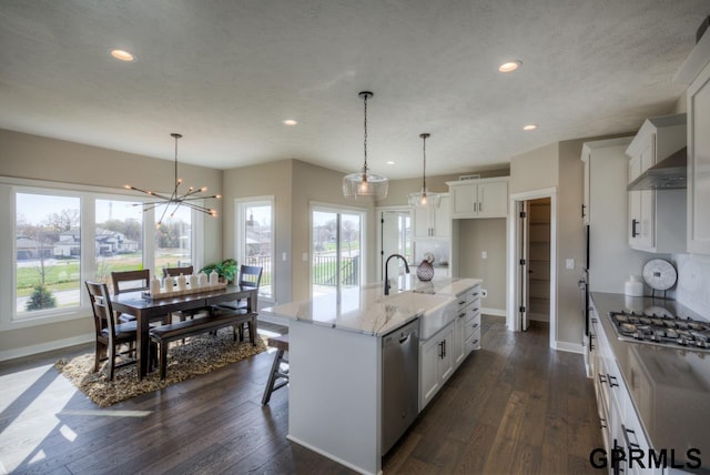 3103 N 184th St, Elkhorn, NE 68022 - kitchen featuring stainless steel appliances, recessed lighting, white cabinets, decorative light fixtures, and light stone counters