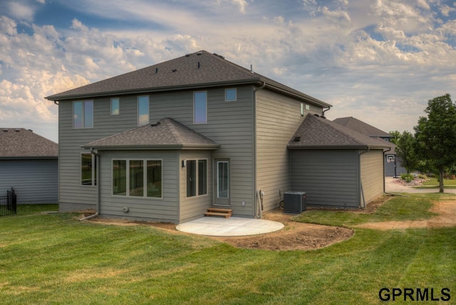 3103 N 184th St, Elkhorn, NE 68022 - back of property featuring a patio, a yard, and a shingled roof