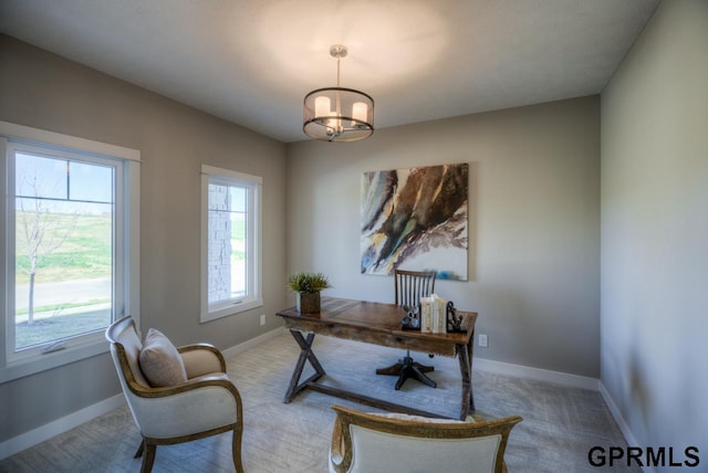 3103 N 184th St, Elkhorn, NE 68022 - carpeted home office featuring a chandelier and healthy amount of natural light