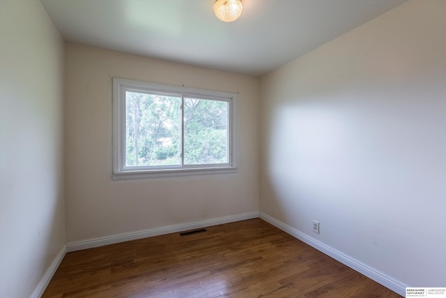 1805 Collins Dr, Bellevue, NE 68005 - empty room with baseboards and wood finished floors