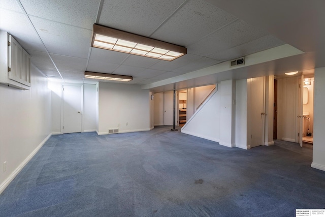 1805 Collins Dr, Bellevue, NE 68005 - finished below grade area featuring carpet flooring, stairs, and a paneled ceiling