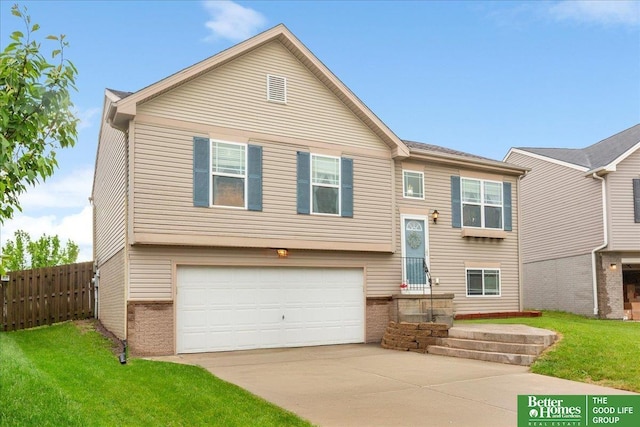 8867 Kimball St, Omaha, NE 68122 - raised ranch with a garage, driveway, and brick siding