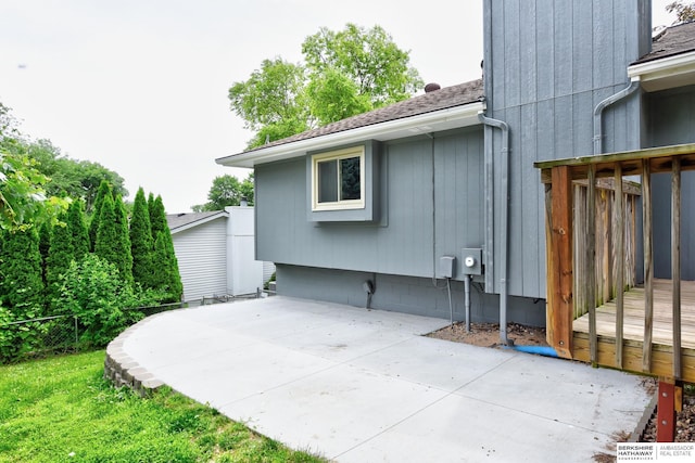 1324 S 162nd St, Omaha, NE 68130 - view of side of property featuring a patio and a shingled roof