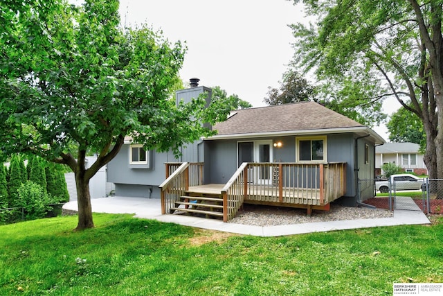 1324 S 162nd St, Omaha, NE 68130 - rear view of house with a deck, a chimney, roof with shingles, and a gate