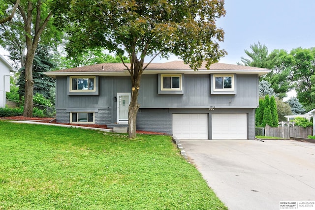 1324 S 162nd St, Omaha, NE 68130 - split foyer home featuring a garage and driveway
