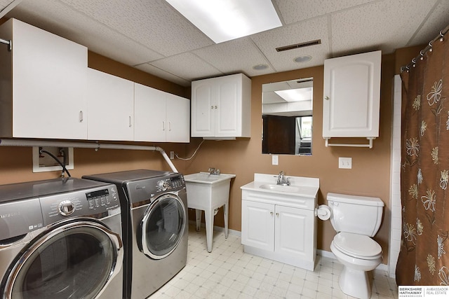 1324 S 162nd St, Omaha, NE 68130 - laundry area featuring washing machine and clothes dryer and baseboards