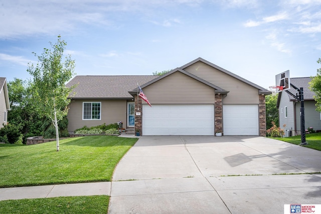 85 Vince Dr, Bennet, NE 68317 - view of front of property with a front lawn, a garage, driveway, and a shingled roof