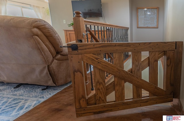 85 Vince Dr, Bennet, NE 68317 - stairway featuring wood finished floors