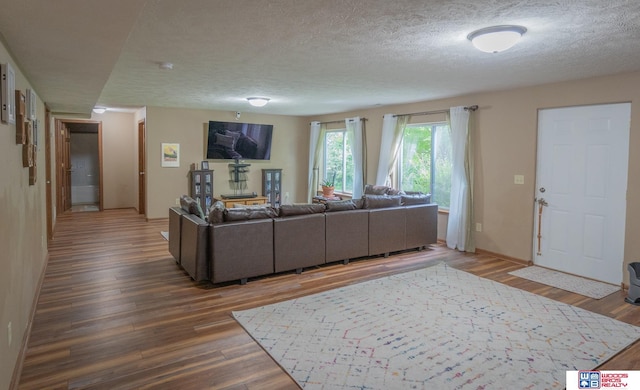 85 Vince Dr, Bennet, NE 68317 - living room with wood finished floors and a textured ceiling