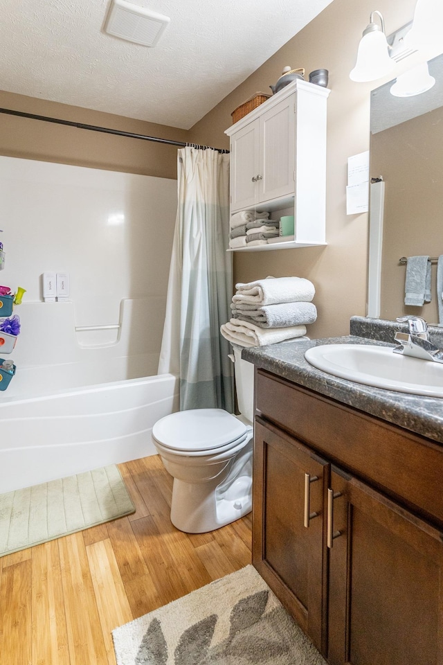 85 Vince Dr, Bennet, NE 68317 - bathroom with vanity, shower / tub combo, and wood finished floors