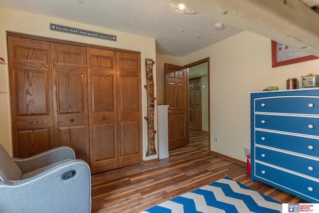 85 Vince Dr, Bennet, NE 68317 - bedroom featuring wood finished floors and a closet