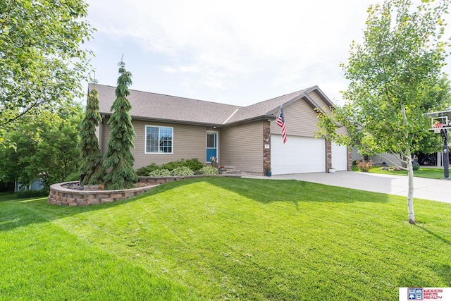 85 Vince Dr, Bennet, NE 68317 - view of front of home featuring a garage, driveway, and a front lawn
