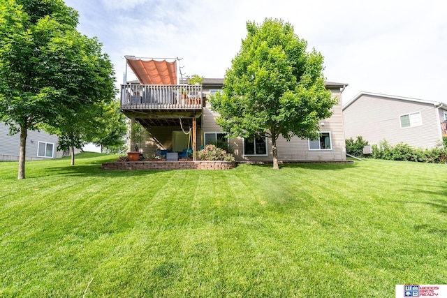 85 Vince Dr, Bennet, NE 68317 - rear view of property featuring a lawn and a deck