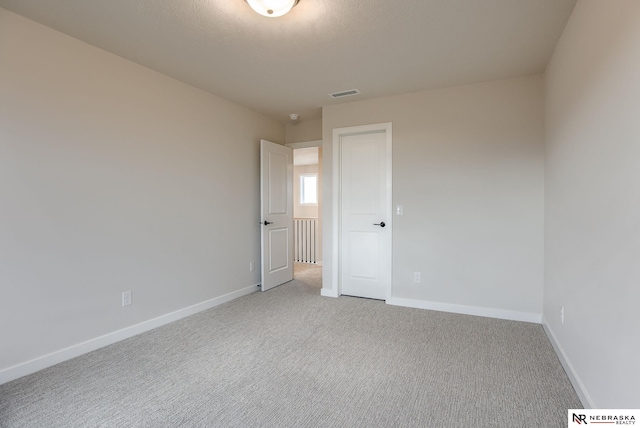 11920 S 109th St, Papillion, NE 68046 - spare room featuring light colored carpet and baseboards
