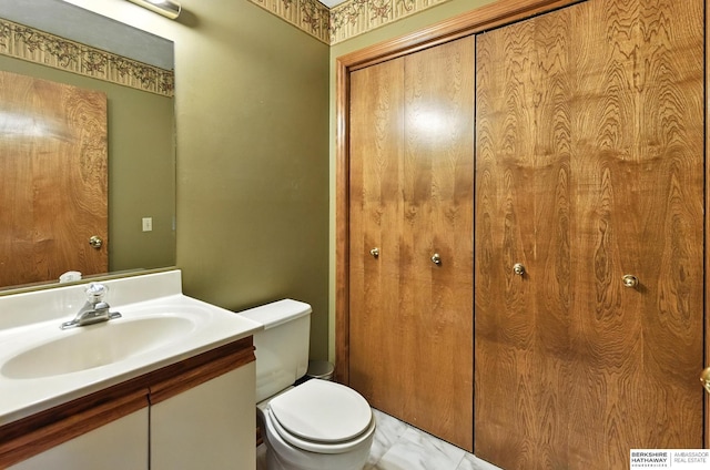 2108 S 62nd St, Omaha, NE 68106 - bathroom featuring vanity and marble look tile flooring