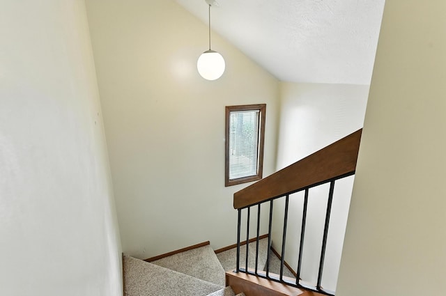 2108 S 62nd St, Omaha, NE 68106 - stairway with lofted ceiling and carpet